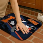 customized-illinois-fighting-illini-mickey-quarterback-blue-black-doormat-best-selling.webp