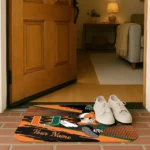 customized-miami-hurricanes-mickey-quarterback-orange-black-doormat-best-selling.webp