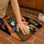 customized-miami-hurricanes-mickey-quarterback-orange-black-doormat-best-selling.webp