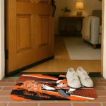 customized-sam-houston-bearkats-mickey-quarterback-orange-black-doormat-best-selling.webp