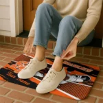 customized-sam-houston-bearkats-mickey-quarterback-orange-black-doormat-best-selling.webp