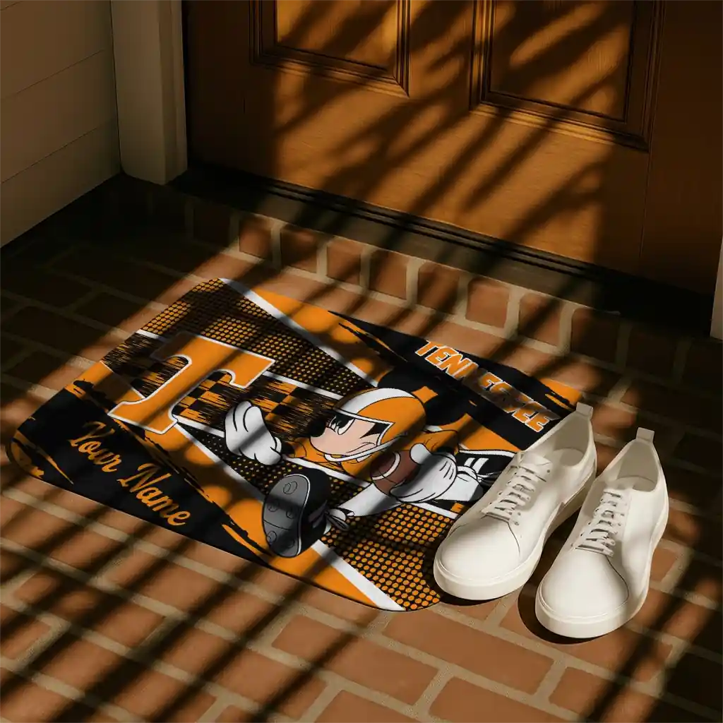 customized-tennessee-volunteers-mickey-quarterback-orange-black-doormat-trendy.webp
