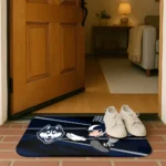customized-uconn-huskies-mickey-quarterback-blue-black-doormat-best-selling.webp