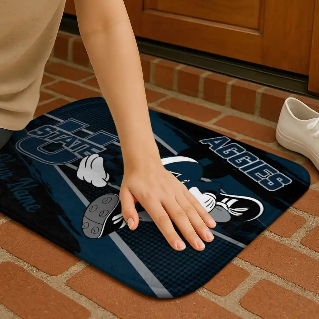 customized-utah-state-aggies-mickey-quarterback-navy-black-doormat-premium-grade.webp