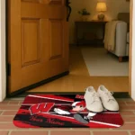 customized-wisconsin-badgers-mickey-quarterback-red-black-doormat-best-selling.webp