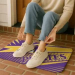 east-carolina-pirates-sharp-flash-purple-doormat-best-selling.webp