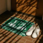 eastern-michigan-eagles-helmet-illustration-green-doormat-best-selling.webp