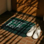 hawaii-rainbow-warriors-tribal-detailing-green-black-doormat-best-selling.webp