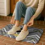 iowa-hawkeyes-chevron-geometrics-black-doormat-best-selling.webp