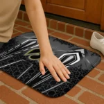 iowa-hawkeyes-graphic-stripes-black-doormat-best-selling.webp