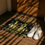 iowa-hawkeyes-helmet-illustration-black-doormat-best-selling.webp