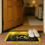 iowa-hawkeyes-pixel-blur-black-doormat-best-selling.webp