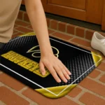 iowa-hawkeyes-silver-halftone-black-doormat-best-selling.webp