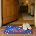 kansas-jayhawks-helmet-illustration-blue-doormat-best-selling.webp
