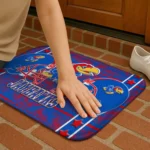 kansas-jayhawks-helmet-illustration-blue-doormat-best-selling.webp