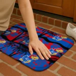kansas-jayhawks-palm-silhouette-blue-black-doormat-best-selling.webp