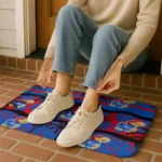 kansas-jayhawks-palm-silhouette-blue-black-doormat-best-selling.webp