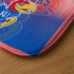 kansas-jayhawks-pixel-blur-blue-doormat-best-selling.webp