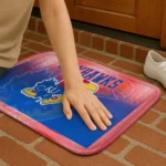 kansas-jayhawks-pixel-blur-blue-doormat-best-selling.webp