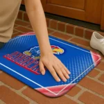kansas-jayhawks-silver-halftone-blue-doormat-best-selling.webp