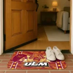 louisiana-monroe-warhawks-helmet-illustration-red-doormat-best-selling.webp
