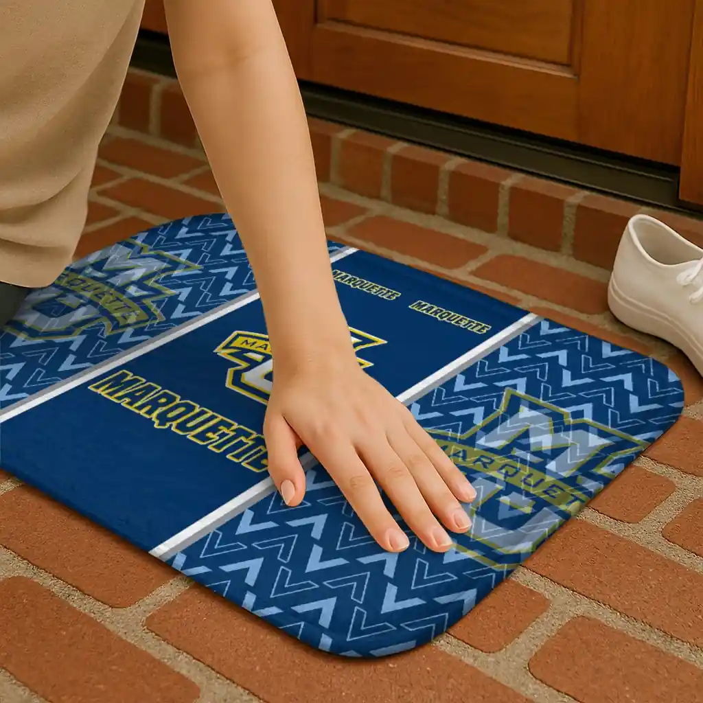 marquette-golden-eagles-chevron-stack-blue-doormat-premium-grade.webp