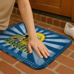 marquette-golden-eagles-helmet-centerpiece-blue-doormat-best-selling.webp