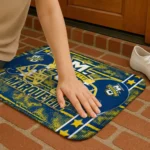 marquette-golden-eagles-helmet-illustration-blue-doormat-best-selling.webp