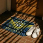marquette-golden-eagles-layered-lines-blue-doormat-best-selling.webp