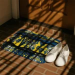 marquette-golden-eagles-palm-silhouette-blue-black-doormat-best-selling.webp
