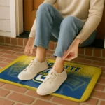 marquette-golden-eagles-pixel-blur-blue-doormat-best-selling.webp
