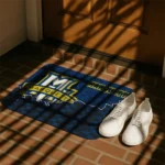 marquette-golden-eagles-tribal-detailing-blue-black-doormat-best-selling.webp