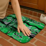 marshall-thundering-herd-palm-silhouette-green-black-doormat-best-selling.webp