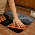 miami-hurricanes-chevron-points-orange-black-doormat-best-selling.webp