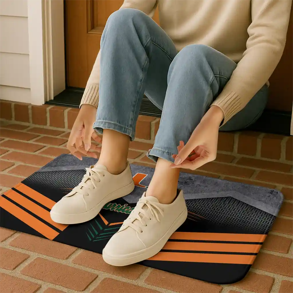 miami-hurricanes-chevron-points-orange-black-doormat-top-rated.webp