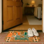 miami-hurricanes-helmet-illustration-orange-doormat-best-selling.webp
