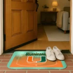 miami-hurricanes-pixel-blur-orange-doormat-best-selling.webp