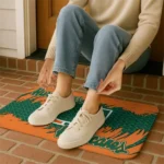 miami-hurricanes-plate-rip-orange-doormat-best-selling.webp