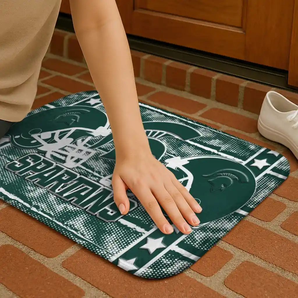 michigan-state-spartans-helmet-illustration-green-doormat-premium-grade.webp