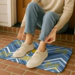 michigan-wolverines-chevron-geometrics-blue-doormat-best-selling.webp