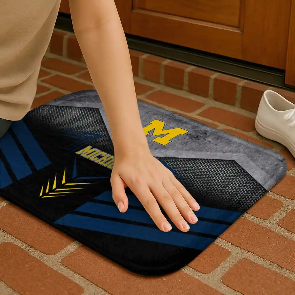 michigan-wolverines-chevron-points-blue-black-doormat-premium-grade.webp