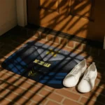 michigan-wolverines-chevron-points-blue-black-doormat-best-selling.webp