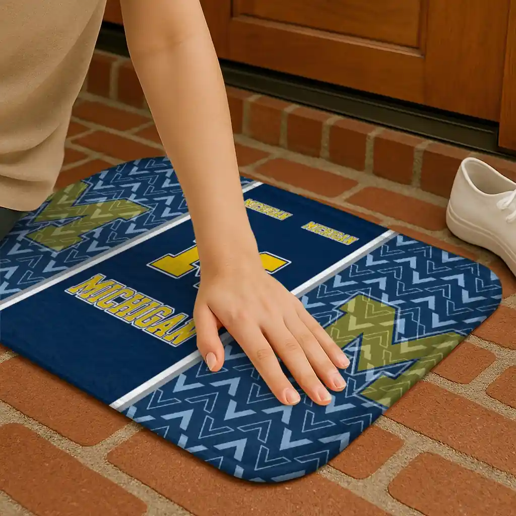 michigan-wolverines-chevron-stack-blue-doormat-premium-grade.webp