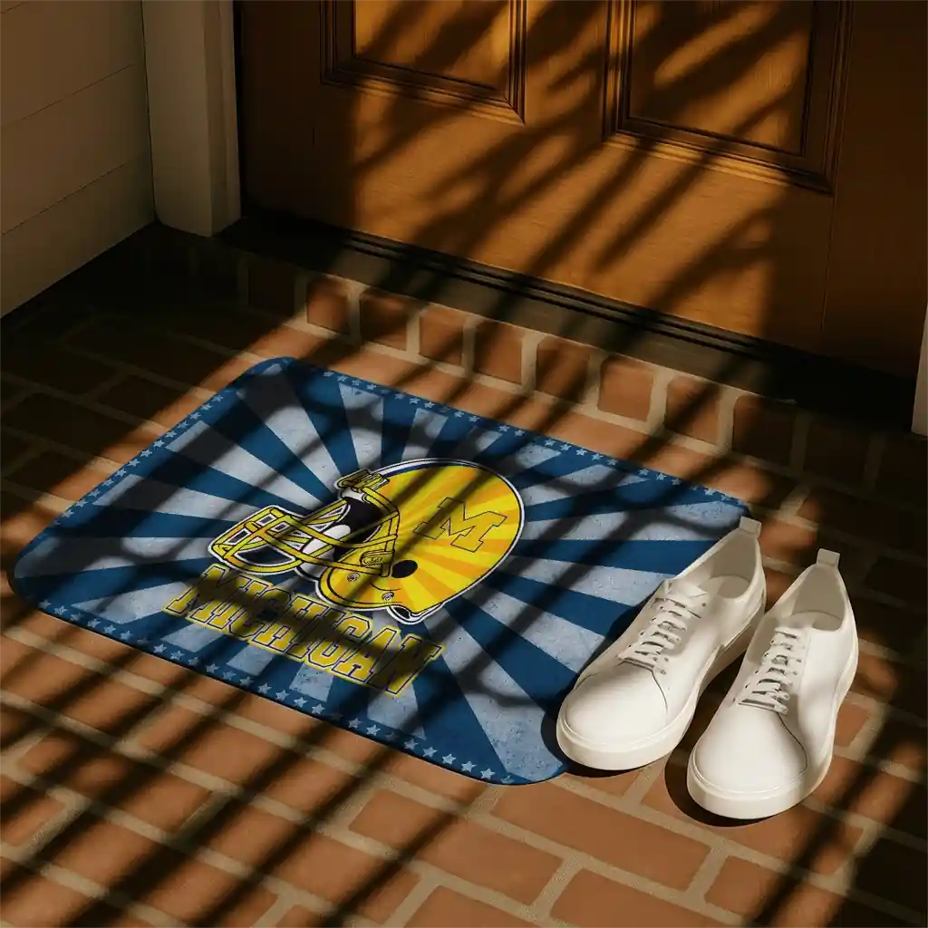 michigan-wolverines-helmet-centerpiece-blue-doormat-trendy.webp