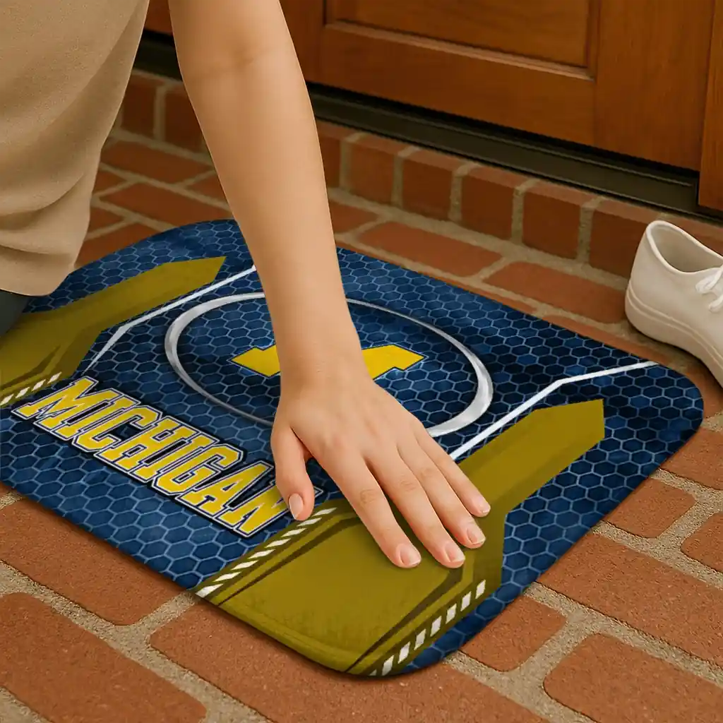michigan-wolverines-hexagon-oval-blue-doormat-premium-grade.webp