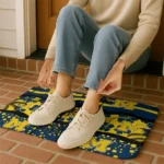 michigan-wolverines-palm-silhouette-blue-black-doormat-best-selling.webp