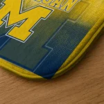 michigan-wolverines-pixel-blur-blue-doormat-best-selling.webp