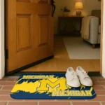 michigan-wolverines-plate-rip-blue-doormat-best-selling.webp