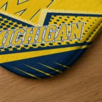 michigan-wolverines-sharp-flash-blue-doormat-best-selling.webp