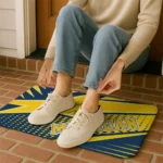 michigan-wolverines-sharp-flash-blue-doormat-best-selling.webp